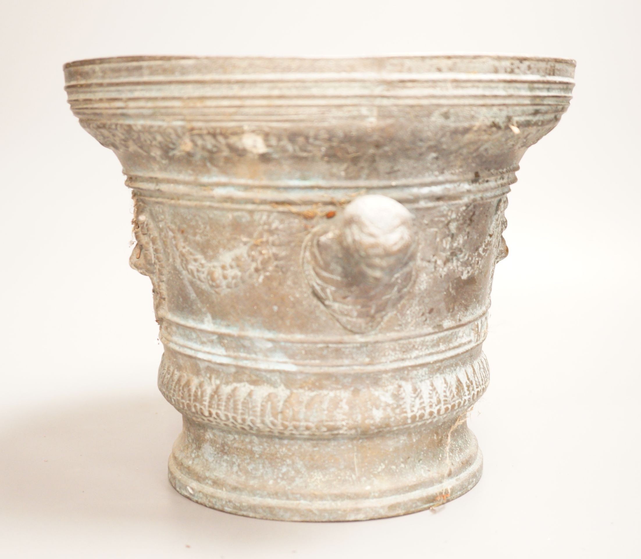 A bronze mortar, dated 1630, 21cm